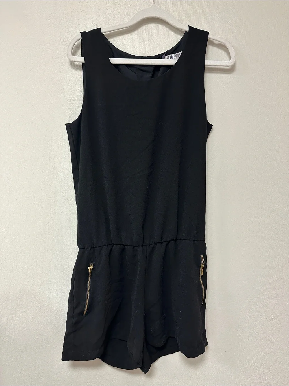 Black Sleeveless Romper with Gold Zipper Accents Open Back